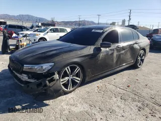 2019 BMW 7 Series 740i with VIN WBA7E2C59KB216498, listed as a Copart auction lot 86039154 with 87,395 mi miles and Salvage Title. Bid and sale history available at carsss.com. Image 1.
