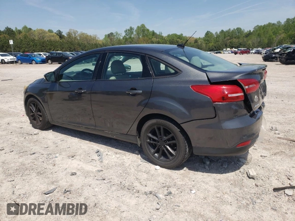 2016 Ford Focus SE z VIN 1FADP3F23GL355587, wystawiony jako Copart lot #53462345 z przebiegiem 101 628 mil mil oraz Szkoda całkowita • Salvage title. Historia ofert i sprzedaży dostępna na DreamBid. Obrazek 2.