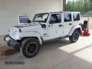 2012 Jeep Wrangler Unlimited Sahara with VIN 1C4BJWEG7CL275883, listed as a IAAI auction lot 42510764 with 149,531 mi miles and . Bid and sale history available at DreamBid. Image 18.