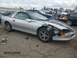 1997 Chevrolet Camaro z VIN 2G1FP22K8V2156852, wystawiony jako Copart lot #51080085 z przebiegiem 163 068 mil mil oraz Szkoda całkowita • Salvage title. Historia ofert i sprzedaży dostępna na DreamBid. Obrazek 4.