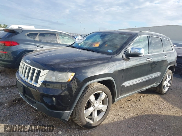2013 Jeep Grand Cherokee Overland with VIN 1C4RJECT2DC546634, listed as a IAAI auction lot 41180807 with 111,897 mi miles. Bid and sale history available at carsss.com. Image 2.