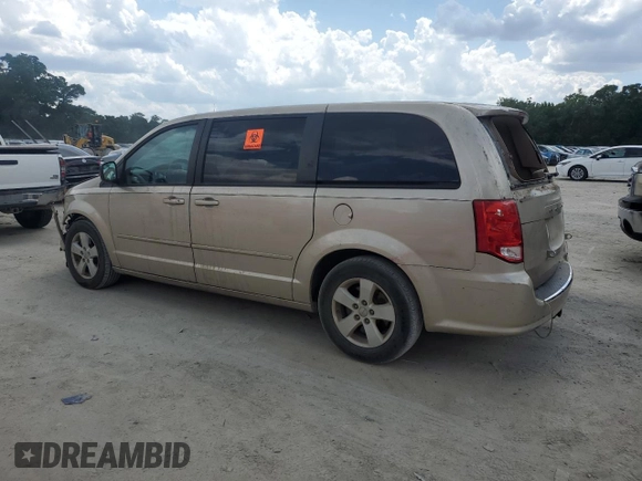2013 Dodge Grand Caravan SE with VIN 2C4RDGBG3DR693415, listed as a Copart auction lot 54848235 with 114,063 mi miles and Salvage Title. Bid and sale history available at DreamBid. Image 2.