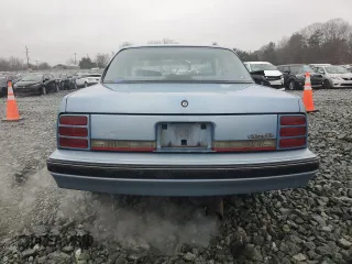 1991 Oldsmobile Cutlass z VIN 1G3AL54N3M6343029, wystawiony jako Copart lot #43965995 z przebiegiem 198 977 mil mil oraz Szkody całkowita. Historia ofert i sprzedaży dostępna na DreamBid. Obrazek 6.