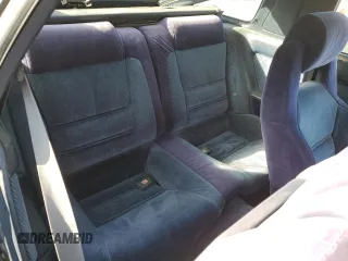 1986 Toyota Supra z VIN JT2MA70L2G0012221, wystawiony jako Copart lot #87328804 z przebiegiem 142 252 mil mil oraz Szkoda całkowita • Salvage title. Historia ofert i sprzedaży dostępna na DreamBid. Obrazek 10.