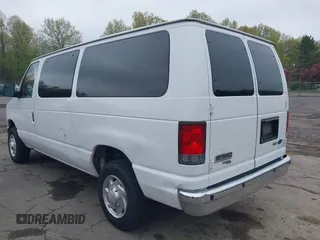 2014 Ford Econoline Passenger XL with VIN 1FBNE3BL4EDA97935, listed as a IAAI auction lot 42187031 with 228,696 mi miles. Bid and sale history available at carsss.com. Image 3.