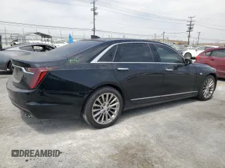 2019 Cadillac CT6 Luxury AWD с VIN 1G6KB5RS5KU132447, выставлен на аукционе Copart как лот 61959735 с пробегом 73 409 миль миль и Списание • Salvage title. История ставок и продаж доступна на DreamBid. Изображение 3.