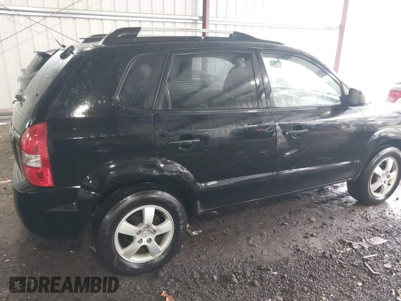 2005 Hyundai Tucson GL with VIN KM8JM12B75U072080, listed as a IAAI auction lot 41779464 with 191,771 mi miles. Bid and sale history available at carsss.com. Image 6.