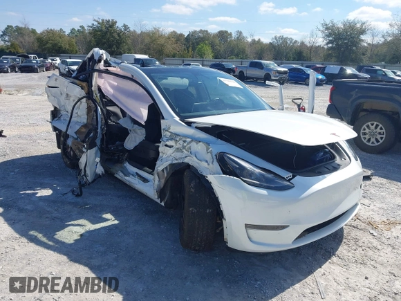 2023 Tesla Model Y Long Range with VIN 7SAYGAEE1PF665934, listed as a IAAI auction lot 41780949 with 21,949 mi miles and . Bid and sale history available at DreamBid. Image 1.