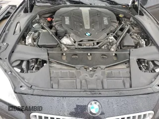 2017 BMW 6 Series z VIN WBA6H5C3XHG238010, wystawiony jako Copart lot #87314274 z przebiegiem 69 607 mil mil oraz Szkoda całkowita • Salvage title. Historia ofert i sprzedaży dostępna na DreamBid. Obrazek 11.