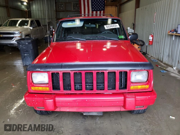 2001 Jeep Cherokee Sport with VIN 1J4FF58S01L519670, listed as a Copart auction lot 84340454 with 132,584 mi miles and Clean title. Bid and sale history available at DreamBid. Image 5.