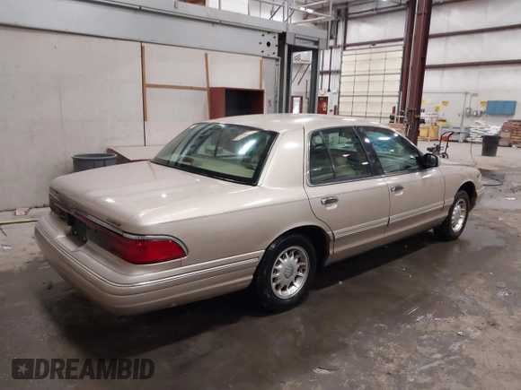 1997 Mercury Grand Marquis LS with VIN 2MELM75W2VX692003, listed as a IAAI auction lot 41547614 with 148,499 mi miles and . Bid and sale history available at DreamBid. Image 4.