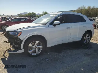 2020 Audi Q3 Premium with VIN WA1AECF30L1023652, listed as a Copart auction lot 57148915 with 69,621 mi miles and Salvage title. Bid and sale history available at DreamBid. Image 1.