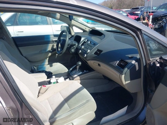 2010 Honda Civic Sdn LX with VIN 2HGFA1F52AH515600, listed as a IAAI auction lot 41805888 with 172,245 mi miles. Bid and sale history available at carsss.com. Image 5.