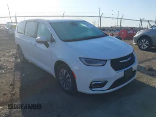 2023 Chrysler Pacifica Hybrid Touring L with VIN 2C4RC1L74PR562240, listed as a IAAI auction lot 42060669 with 45,882 mi miles and . Bid and sale history available at DreamBid. Image 1.