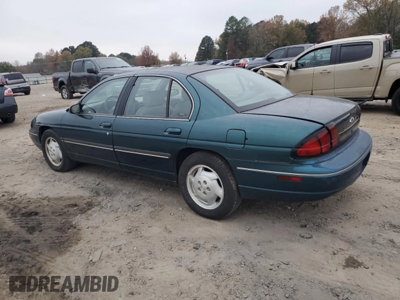 1997 Chevrolet Lumina LS with VIN 2G1WL52M3V9163567, listed as a Copart auction lot 82772324 with 191,852 mi miles and Salvage Title. Bid and sale history available at DreamBid. Image 2.