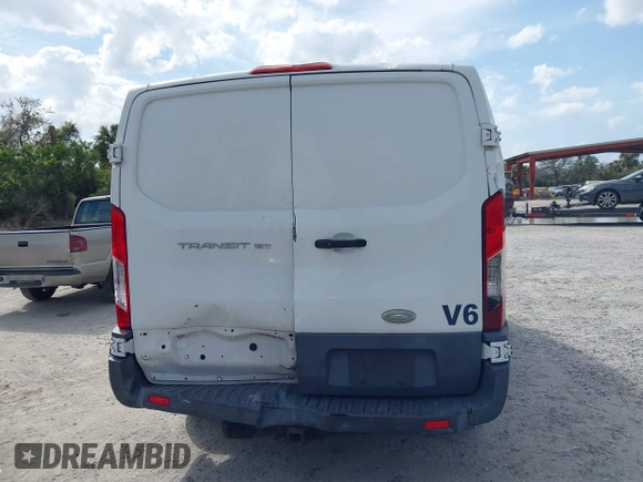 2015 Ford Transit Cargo with VIN 1FTNE1YM0FKA36529, listed as a IAAI auction lot 41731422 with 229,660 mi miles and . Bid and sale history available at DreamBid. Image 16.