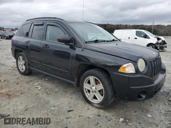 2008 Jeep Compass Sport with VIN 1J8FT47W28D766523, listed as a Copart auction lot 41433795 with 213,505 mi miles and Salvage Title. Bid and sale history available at carsss.com. Image 4.