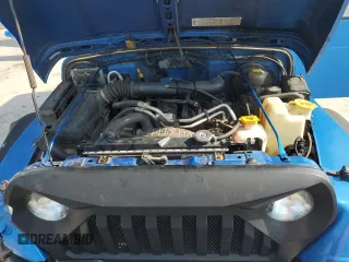 2002 Jeep Wrangler X with VIN 1J4FA39S92P776435, listed as a Copart auction lot 62792235 with 182,385 mi miles and Salvage title. Bid and sale history available at DreamBid. Image 11.