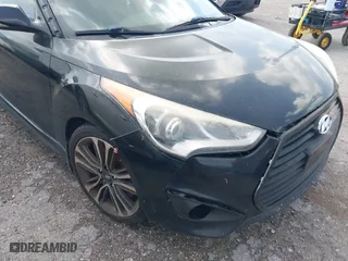 2016 Hyundai Veloster Turbo with VIN KMHTC6AE1GU271374, listed as a IAAI auction lot 41924768 with 93,072 mi miles. Bid and sale history available at carsss.com. Image 6.
