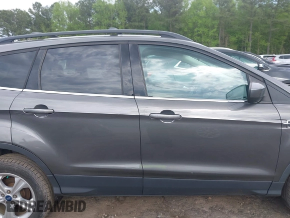 2013 Ford Escape SE with VIN 1FMCU9GX4DUC98328, listed as a IAAI auction lot 41956249 with 114,195 mi miles and . Bid and sale history available at DreamBid. Image 12.