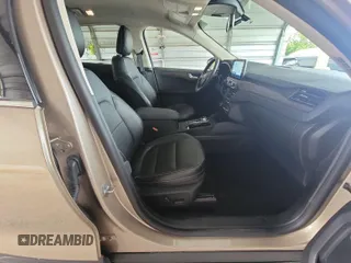 2020 Ford Escape Titanium Hybrid with VIN 1FMCU0DZ5LUB81972, listed as a IAAI auction lot 42679188 with 19,400 mi miles and . Bid and sale history available at DreamBid. Image 6.