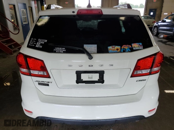 2012 Dodge Journey Crew z VIN 3C4PDCDG6CT184654, wystawiony jako Copart lot #64271625 z przebiegiem 187 734 mil mil oraz Szkoda całkowita • Salvage title. Historia ofert i sprzedaży dostępna na DreamBid. Obrazek 6.