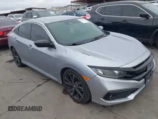 2019 Honda Civic Sport with VIN 19XFC2F8XKE005999, listed as a IAAI auction lot 41953133 with 146,343 mi miles and . Bid and sale history available at DreamBid. Image 1.