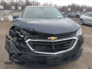 2018 Chevrolet Equinox LT with VIN 3GNAXJEV2JL293664, listed as a IAAI auction lot 41911923 with 105,057 mi miles and . Bid and sale history available at DreamBid. Image 13.