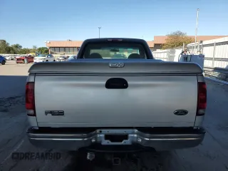 1999 Ford F-150 XL with VIN 1FTRF17L7XNA73732, listed as a Copart auction lot 74388514 with Not provided miles and Clean title. Bid and sale history available at DreamBid. Image 6.