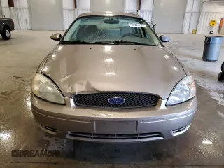 2007 Ford Taurus SEL с VIN 1FAFP56U07A103054, выставлен на аукционе Copart как лот 59935755 с пробегом 123 975 миль миль и Списание • Salvage title. История ставок и продаж доступна на DreamBid. Изображение 5.