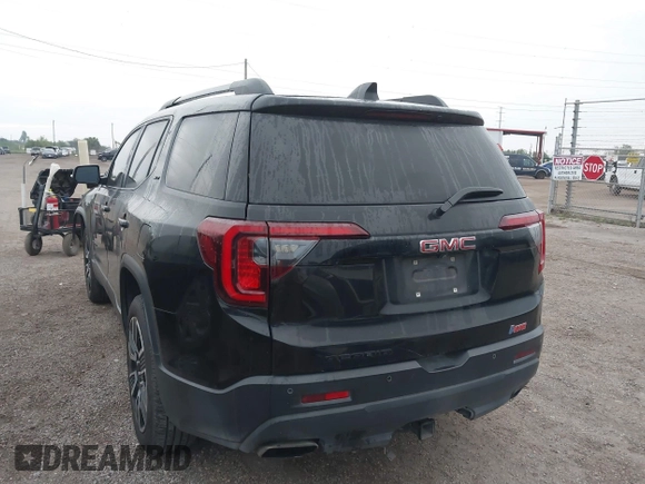 2021 GMC Acadia SLT with VIN 1GKKNMLS4MZ141920, listed as a IAAI auction lot 41149390 with 81,090 mi miles. Bid and sale history available at carsss.com. Image 3.
