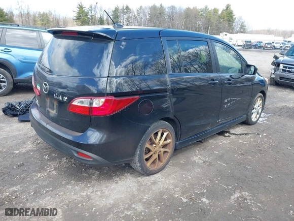 2012 Mazda Mazda5 Touring with VIN JM1CW2CL8C0111574, listed as a IAAI auction lot 41999112 with 126,963 mi miles. Bid and sale history available at carsss.com. Image 4.
