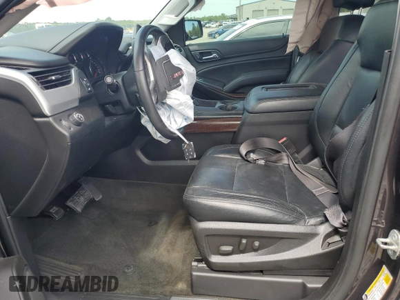 2015 GMC Yukon XL SLE z VIN 1GKS1GKC2FR625157, wystawiony jako Copart lot #69628124 z przebiegiem 153 022 mil mil oraz Szkoda całkowita • Salvage title. Historia ofert i sprzedaży dostępna na DreamBid. Obrazek 7.