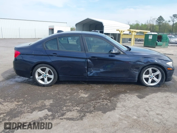 2013 BMW 3 Series 328i xDrive with VIN WBA3B5G53DNS02293, listed as a IAAI auction lot 42012883 with 243,490 mi miles. Bid and sale history available at carsss.com. Image 13.