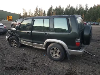 2002 Isuzu Trooper S с VIN JACDJ58X427J04562, выставлен на аукционе Copart как лот 79278184 с пробегом Не указан миль и Списание • Salvage title. История ставок и продаж доступна на DreamBid. Изображение 2.