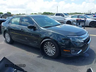 2010 Ford Fusion Hybrid z VIN 3FADP0L34AR224317, wystawiony jako IAAI lot #42683039 z przebiegiem 260 289 mil mil oraz . Historia ofert i sprzedaży dostępna na DreamBid. Obrazek 1.