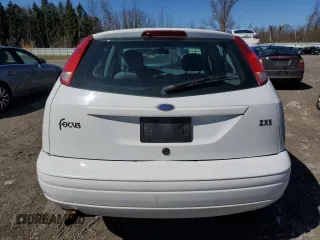2004 Ford Focus with VIN 3FAFP37Z74R121213, listed as a Copart auction lot 53339645 with 65,590 mi miles and Clean title. Bid and sale history available at DreamBid. Image 6.