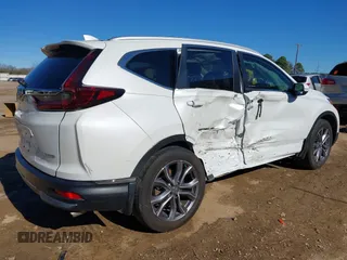 2021 Honda CR-V Touring with VIN 7FARW1H99ME012061, listed as a IAAI auction lot 41168036 with 36,886 mi miles. Bid and sale history available at carsss.com. Image 4.