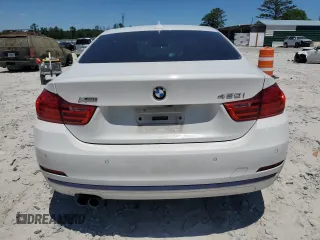 2017 BMW 4 Series 430i xDrive with VIN WBA4R9C3XHK878808, listed as a Copart auction lot 58300774 with 145,067 mi miles and Salvage Title. Bid and sale history available at DreamBid. Image 6.