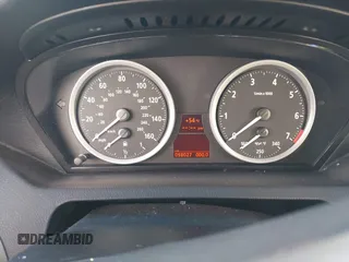 2006 BMW 6 Series 650Ci with VIN WBAEH13406CR50897, listed as a IAAI auction lot 41237283 with 98,027 mi miles. Bid and sale history available at carsss.com. Image 7.