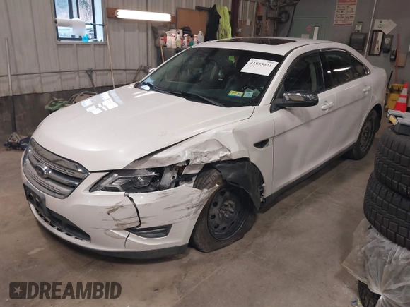 2011 Ford Taurus Limited with VIN 1FAHP2JW7BG148417, listed as a IAAI auction lot 41855021 with 122,372 mi miles and . Bid and sale history available at DreamBid. Image 2.