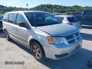 2009 Dodge Grand Caravan SE z VIN 2D8HN44E89R580507, wystawiony jako IAAI lot #42325592 z przebiegiem 168 294 mil mil oraz . Historia ofert i sprzedaży dostępna na DreamBid. Obrazek 1.