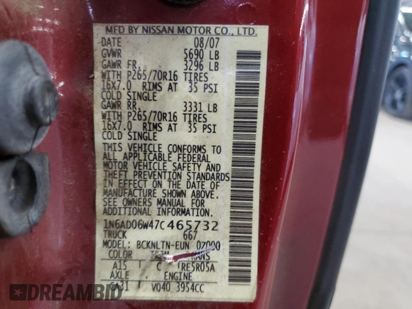 2007 Nissan Frontier Nismo with VIN 1N6AD06W47C465732, listed as a Copart auction lot 65451545 with 145,979 mi miles and Salvage title. Bid and sale history available at DreamBid. Image 12.