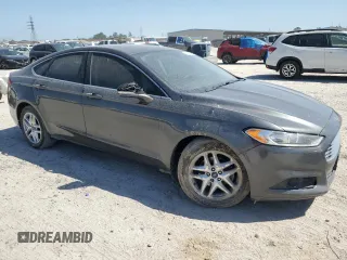 2015 Ford Fusion SE with VIN 3FA6P0HD8FR230364, listed as a Copart auction lot 52631195 with 196,285 mi miles and Salvage title. Bid and sale history available at DreamBid. Image 4.