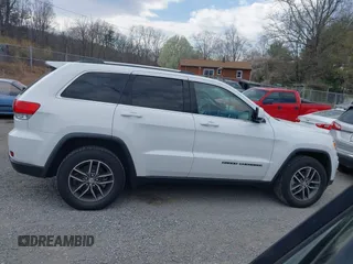 2018 Jeep Grand Cherokee Laredo z VIN 1C4RJFAG1JC479838, wystawiony jako IAAI lot #41903955 z przebiegiem 73 076 mil mil oraz . Historia ofert i sprzedaży dostępna na DreamBid. Obrazek 13.