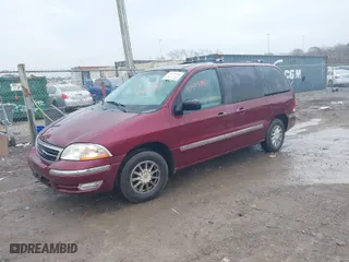 2000 Ford Windstar Wagon SE with VIN 2FMZA5242YBA26977, listed as a IAAI auction lot 41499880 with 1 mi miles. Bid and sale history available at carsss.com. Image 2.