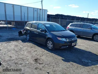 2016 Honda Odyssey SE with VIN 5FNRL5H34GB139571, listed as a IAAI auction lot 41602695 with 118,960 mi miles. Bid and sale history available at carsss.com. Image 1.