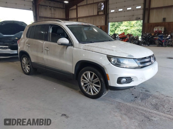 2012 Volkswagen Tiguan SE with VIN WVGAV7AXXCW533237, listed as a IAAI auction lot 42670923 with 227,323 mi miles and . Bid and sale history available at DreamBid. Image 1.
