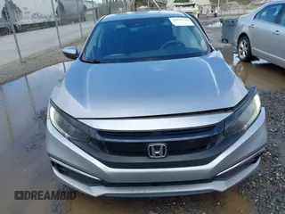 2019 Honda Civic LX with VIN 19XFC2F61KE009471, listed as a IAAI auction lot 42017532 with 81,134 mi miles and . Bid and sale history available at DreamBid. Image 12.