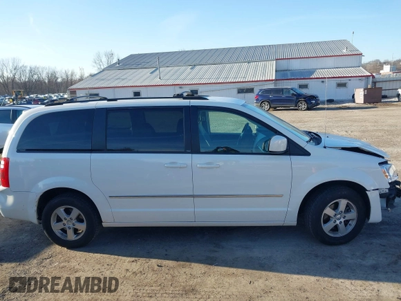 2010 Dodge Grand Caravan SXT with VIN 2D4RN5DX8AR239352, listed as a IAAI auction lot 41773487 with 86,084 mi miles and . Bid and sale history available at DreamBid. Image 13.